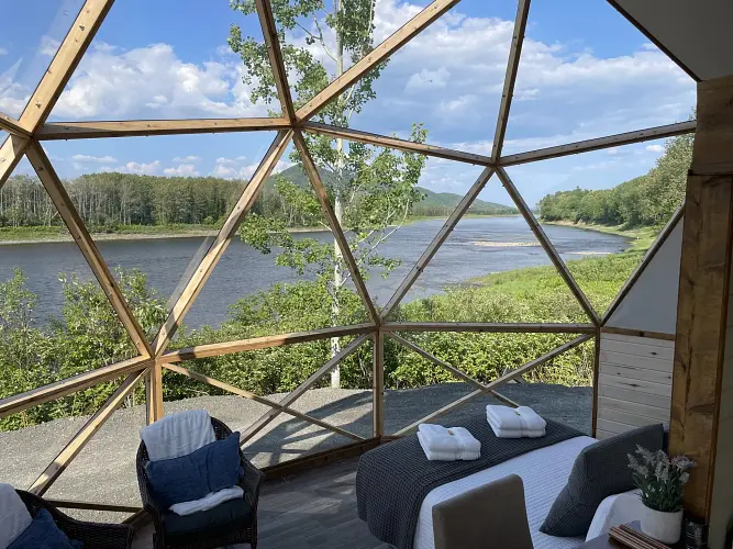 Glass-dome suite with a view of the river